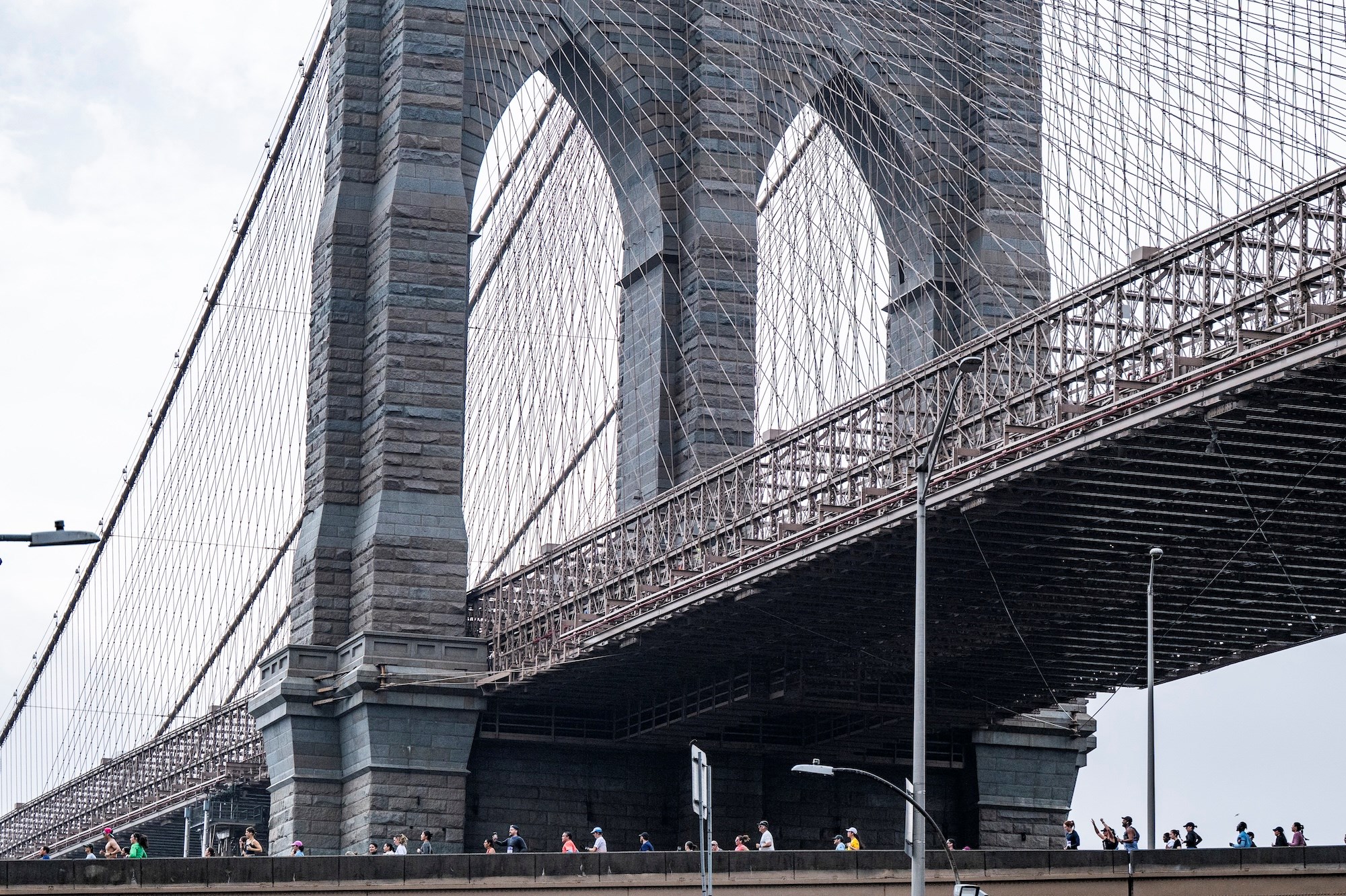 Runners near the Brooklyn Bridge at the 2025 United Airlines NYC Half